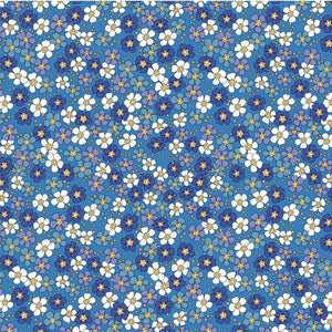 Rainbow Garden fabric: Small white, blue, and purple flowers on a light blue background.