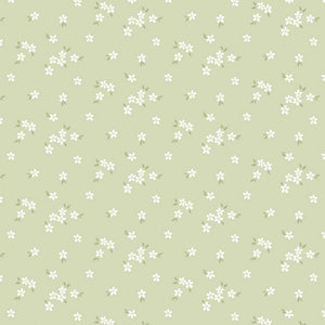 Flowerets - A soft sage green fabric with delicate clusters of tiny white flowers and leaves.