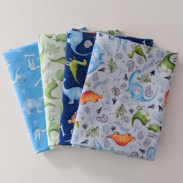 Little Dinosaurs 100% cotton fabric designed by Susan Wheeler, half metre bundle