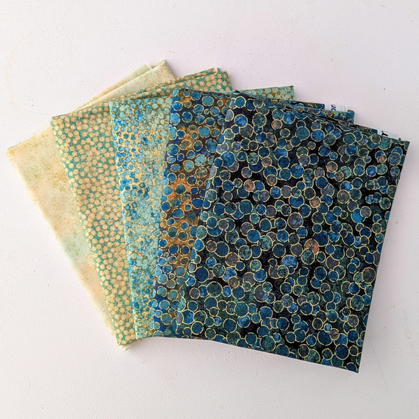 Shimmer in Dawn, a 5 piece 100% cotton fabric collection, designed by Deborah Edwards for Northcott.
