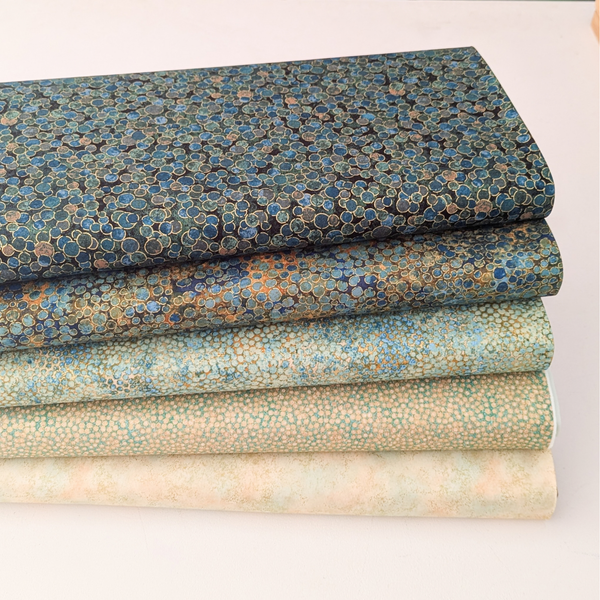 Shimmer in Dawn, a 5 piece 100% cotton fabric collection, designed by Deborah Edwards for Northcott.