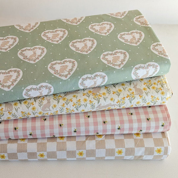 Stack of 4 fabrics from the Spring Hare collection by Craft Cotton Company.